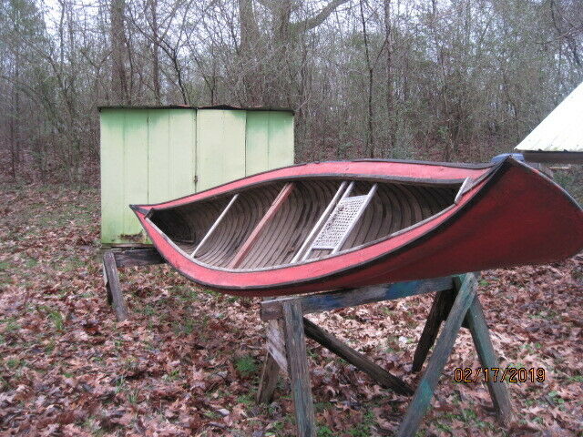 white closed gunnel wood canvas sponson canoe for sale